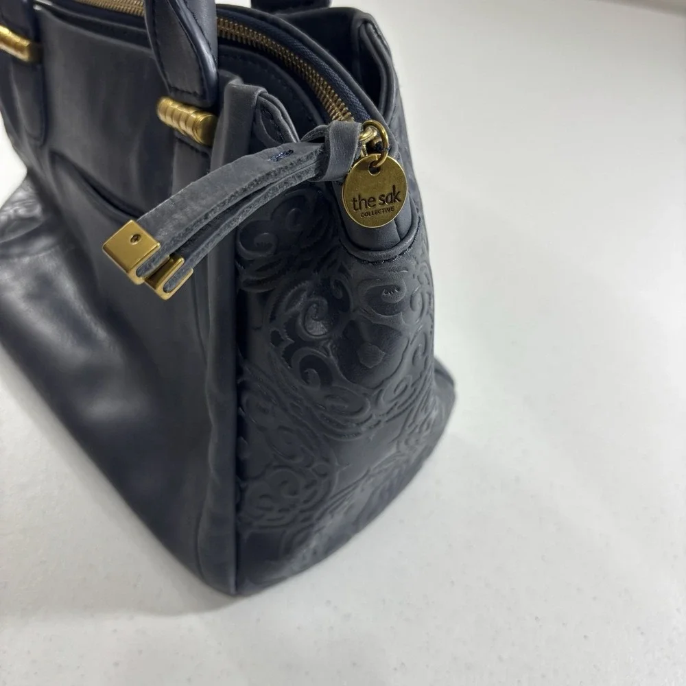 The Sak Serena Leather Handbag Navy Blue Tobacco Souk Floral Embossed